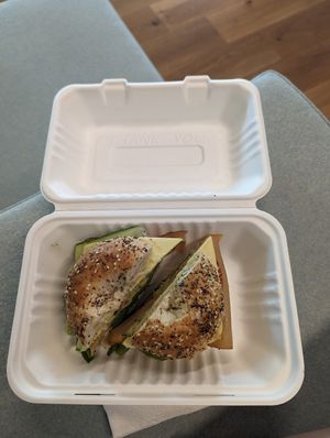 Bagel sandwich with veggies, avocado, hummus, vegan cheese, and vegan lunch meat (so good!!) 🤤 at LaRayia's Bodega in Atlanta