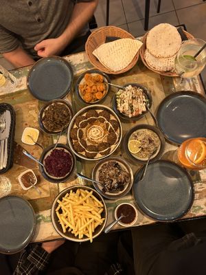 So many different smaller dishes - all super yum!   at 2eat Falafel & Hummus in Riga