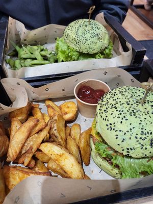 Jungle Burgers, edamame beans, and potato wedges at Flower Burger in Brighton