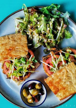 Veggie burger focaccia : 
Lentil and mushrooms burger, tahini spread, Pickled lemon and beetroot at Yoga House in Koh Phangan