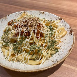 This is so yummy! Very nicely seasoned. $8 for a huge plate of fries, good for sharing! Will definitely return for this dish! at Am I Addicted in Central Singapore