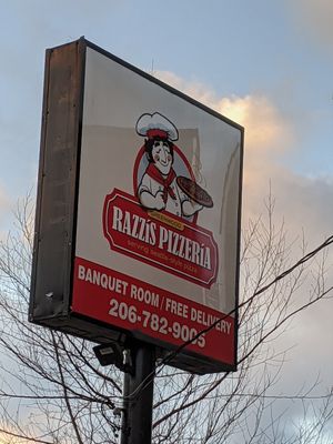 Sign in parking lot at Razzi's Pizzeria - Greenwood Ave in Seattle