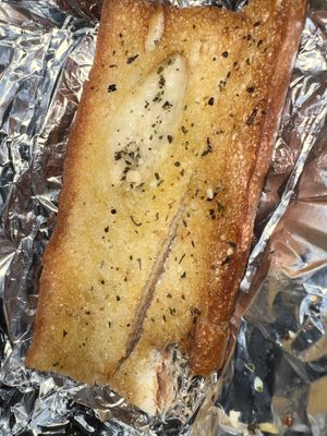 Garlic bread that come with pasta  at Razzi's Pizzeria - Greenwood Ave in Seattle