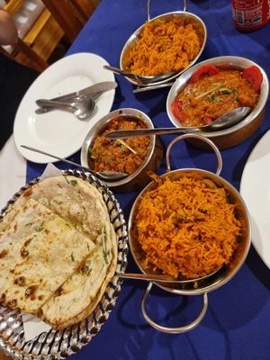Bombay Aloo, Chana Masala, Garlic Naan, Mushroom Biryani at Kohinoor in Krabi