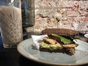 Ch*cken avocado sandwich and oat milk latte   at White Pine - Seven Dials in London
