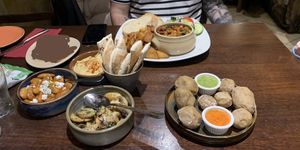 Chickpea stew, hummus with pitta bread, Greek beans, Canarian papas arrugadas and mushrooms al ajillo. All of this was £42.   at The Old Yard Tapas Bar in Darlington