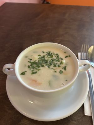 Karfiol Cremesuppe and Erdäpfelgulasch mit Vratwurst 14,50€  at Naturlich Wrenkh in Vienna