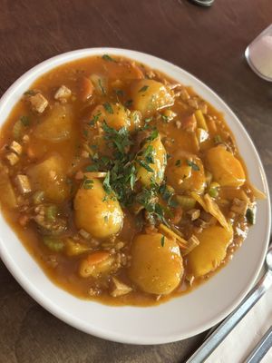 Karfiol Cremesuppe and Erdäpfelgulasch mit Vratwurst 14,50€  at Naturlich Wrenkh in Vienna