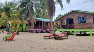 Cabanas at The Coconut Husk Restaurant & Beach Bar in Hopkins