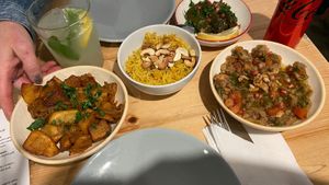 Rice in wine leaves, rice, potatoes, baba ganoush  at Mezze in Lisbon