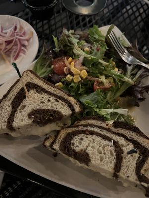 Vegan Rueben with side salad (RED ONIONS WERE INTENSE)  at Secret Garden Cafe in Sedona