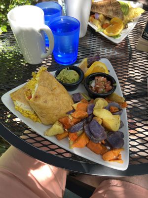 The potatoes were soooo good. The burrito was okay - one of the messiest I’ve ever eaten.   at Secret Garden Cafe in Sedona