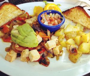 Tofu scramble, potatoes, toast. Be sure to specify VEGAN toast. I was served gf toast with egg by mistake. at Secret Garden Cafe in Sedona