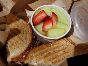 Tempeh sandwiche cup of fruit at Secret Garden Cafe in Sedona