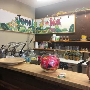 Our new cozy little spot.  Yes that is our old sign we managed to salvage after the fire.   at Jungle Juice Company in Hope