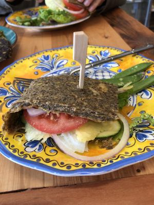  Veggie sandwich on raw onion bread. at Jungle Juice Company in Hope