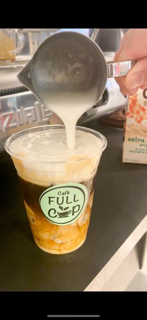 Oatmilk cold brew! Sustainable to-go cups and awesome marine Biodegradable straws😊Vegan food and vegan drinks are the best!   at Café Full Cup in Pittsfield
