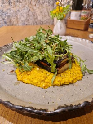 Baked eggplant on turmeric risooto at VegANGELov  in Belgrade