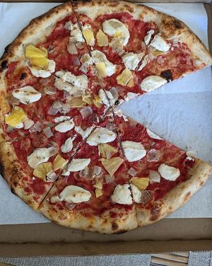 Double mac nut cheeze, pineapple, and carmelized onion.  Real local flavor! at Pau Pizza in Waimea