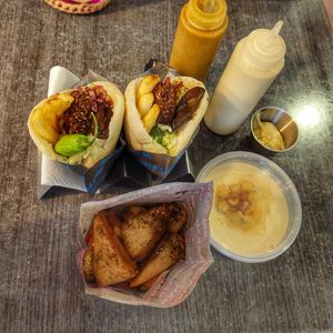 Falafelito. Pita fries in za'atar flavor. Hummus. Tahini w/garlic sauce. at Falafel Yo in Quezon City
