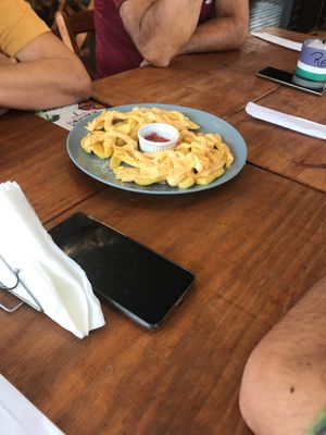 A melhor batata com cheddar e bacon   at Refúgio Veg in Rio De Janeiro