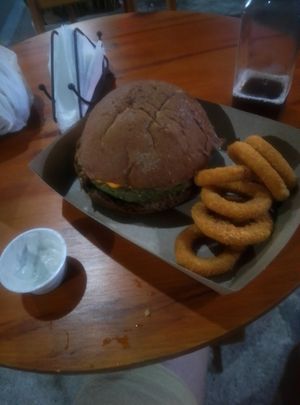 Cheddar burger with onion rings at Refúgio Veg in Rio De Janeiro