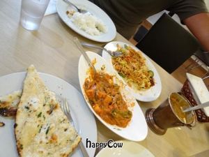 sesame naan, spicy paneer curry, lentil curry, fried noodles at Gokul Vegetarian Restaurant - Fortune Centre in Central Singapore