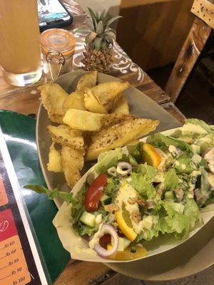 Meal deal additions of salad and home made chips  at Shlomo in Grand Baie
