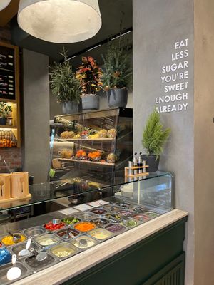 Food prep area and decor at Fit Food in Tirana