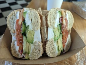Sesame bagel sandwich w vegan cream cheese at Moe's Broadway Bagel in Longmont