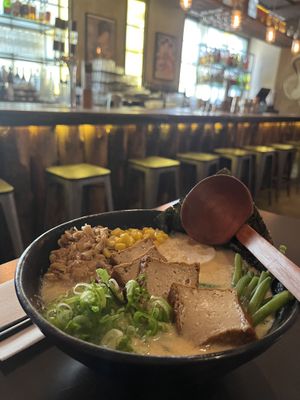 The bar in the background   at Kinton Ramen - McGill in Montreal