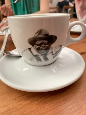 Coffee here has his own cup !  at El Huerto in Santiago
