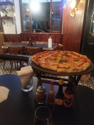 Actually a non vegan trattoria BUT they have (delicious) vegan cheese option!!! Also applies for calzones!!! Such a nice  and cozy place to have vegan dinner in San Luis Potosí. I at Buba's Trattoria in San Luis Potosi