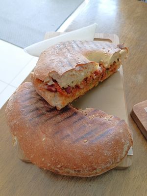 Vegan Ftira - With mix of beans, green olives, tomato and olive oil. at Coffee Circus Joy in Marsalforn