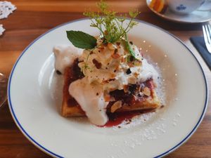 sweet wra waffle "rheintaler" with seasonal home made compote, almond joghurt & whipped lentil cream at Formidable Pelikan in St Gallen