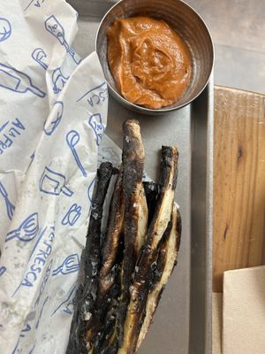 Starter which was fried onions and spicy sauce  at A la Fresca in Denia