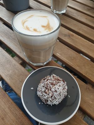 Coconut choco Ball and latte macchiato with oat milk at Qoffee in Malmo