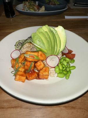Crispy Tofu Bowl (vegan) with Korean chili spiced tofu, edamame, miso dressing, cucumber, brown rice, avocado, black sesame seeds, and a slaw (~$22)  at JOEY in Houston