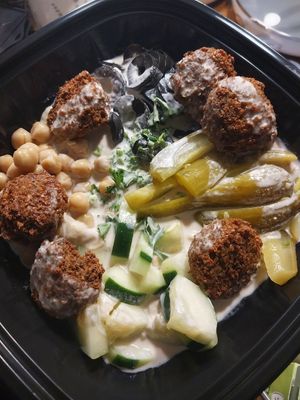 baba ghannouj, chickpeas, Arabic pickles, black olives, cucumber, parsley, falafel and tahini ✌️ at Pita or Bowl in Springfield