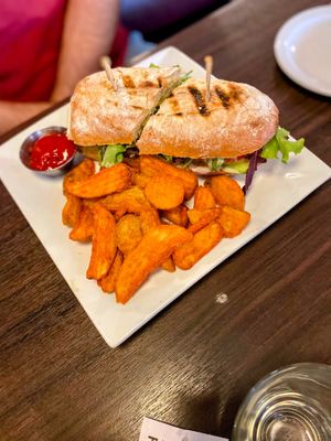 NOPALES TORTA: Fried cactus with avocado, spring mix, tomato, and onion; served with aioli on telera bread. at Mox Boarding House in Bellevue