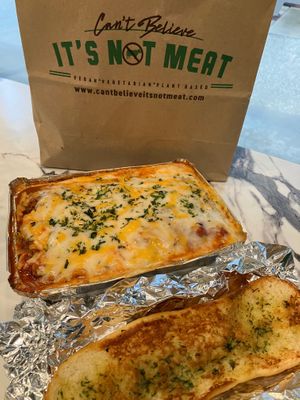 Li'l Italy lasagna with garlic bread at Can't Believe It's Not Meat - Chicago Ave in Chicago