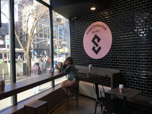 Inside seating at Pizza Collective in New York City