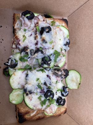 Vegan primavera slice 🤤  at Pizza Collective in New York City