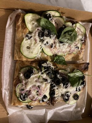   at Pizza Collective in New York City