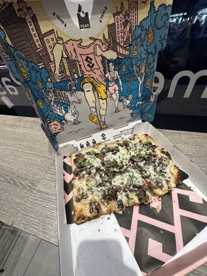 This is 3 slices for the mushroom pizza   at Pizza Collective in New York City