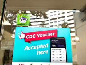 HappyCow sticker, CDC voucher accepted here at Soul Kind Cafe in West Singapore