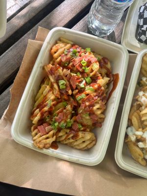 bacon green onion and bbq sauce on top at Mavericks Burger Co in Toronto