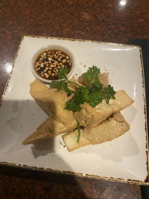 4/5- Fried tofu app. Honestly that sauce on the side is perfect and they sell it in a bottle!! Get it!   at Lemongrass Restaurant & Sake Bar in Moultonborough