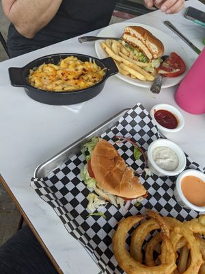 Buffalo Chikin Sandwich w/ onion rings and fries at the hive vegan eatery in Houston