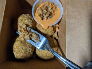 Boudain balls to go at the hive vegan eatery in Houston